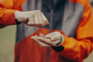 Man working with minerals.